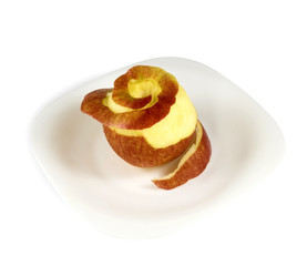Isolated image of a ripe apple on a plate on white background