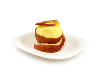 Isolated image of a single apple on a plate on white background