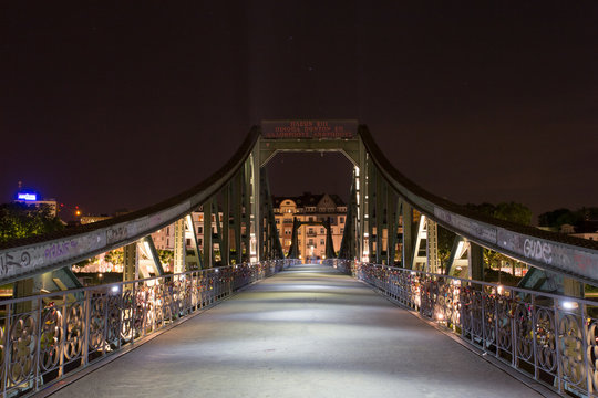 Eiserner Steg Bridge In Frankfurt City At Night