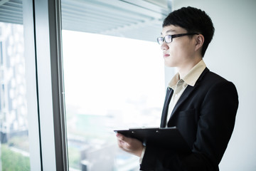 Fototapeta premium happy young business man work in modern office