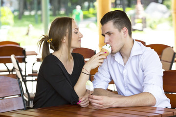 man and woman walking in the park