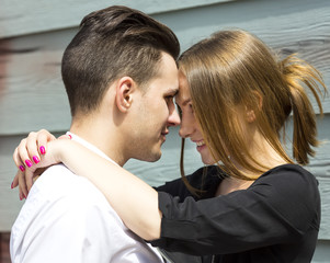 man and woman walking in the park