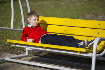 Portrait of a boy on a summer nature
