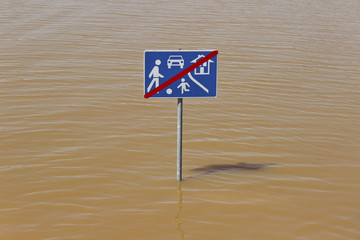 Play street traffic sign in flood