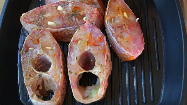 Cooking a Fish (Red Snapper). Speed up.