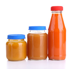 Baby food in glass jars, isolated on white