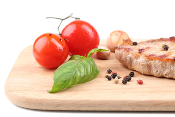 Grilled steak with spices, herbs and vegetables