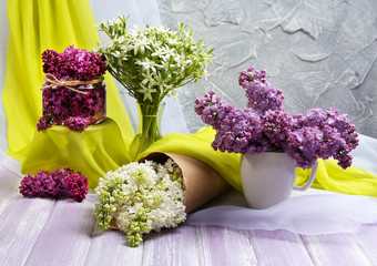 Beautiful lilac flowers on wooden table