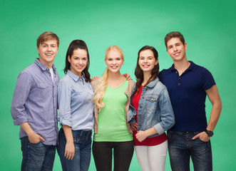 group of standing smiling students