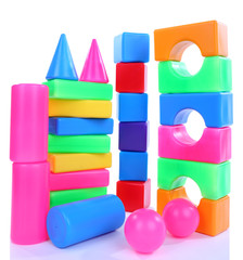 Colorful plastic toys isolated on white