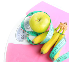 Bunch of mini bananas and measuring tape
