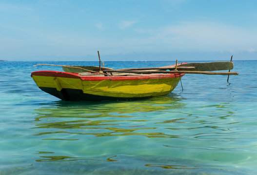 Fototapeta An old fishing boat near Labadee, Haiti