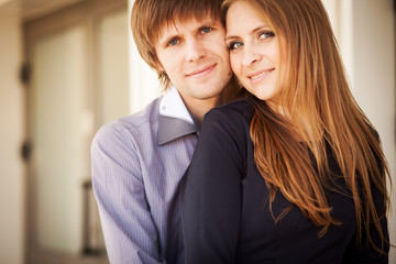 Portrait of a happy couple laughing at camera