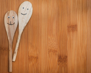 wooden kitchenware on cutting board abstract food background