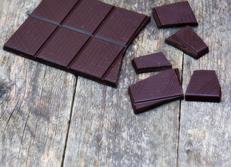 dark chocolate blocks with fresh mint leaves