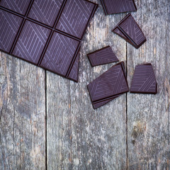 dark chocolate blocks with fresh mint leaves