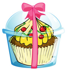 A cupcake with a pink ribbon