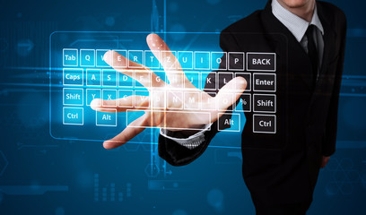 Businessman pressing virtual type of keyboard
