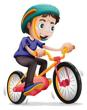 A young boy riding a bicycle