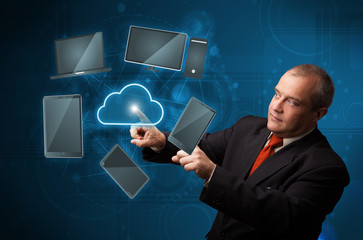 Businessman touching high technology cloud service