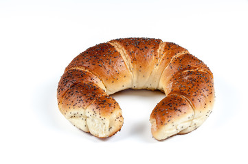 Fresh and tasty croissant over white background