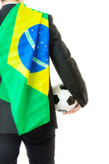 Rear view of businessman with soccerball and brazil flag
