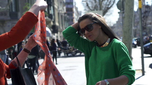 Women bringing scarf from bag, slow motion shot at 120fps, stead