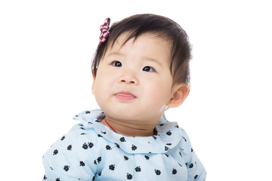 Asia baby girl looking upward
