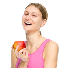 Young happy girl with apple