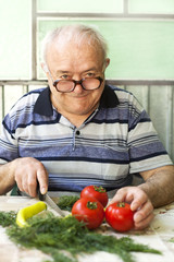 elderly man preparing healthy food