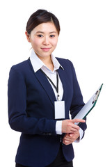 Businesswoman with clipboard