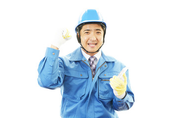 ガッツポーズの作業員