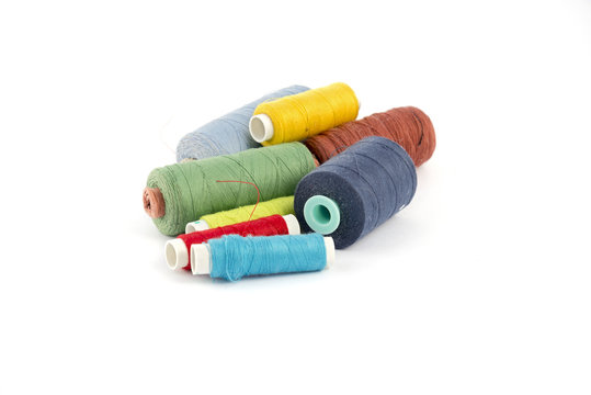 Colorful thread lie on a white background
