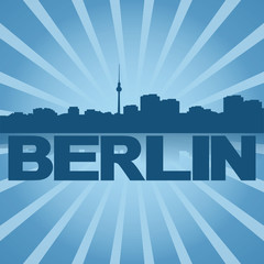 Berlin skyline reflected with blue sunburst illustration