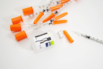 Obraz premium Disposible Needles with a Vial of Insuline