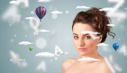 Beautiful young woman with wellness and healthcare clouds