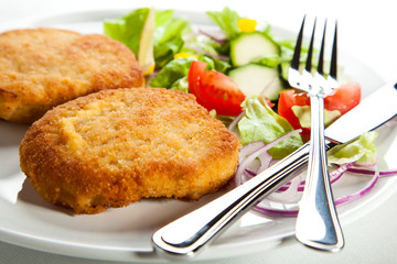 Fried pork chop with vegetables