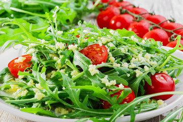 couscous salad with arugula and cherry tomatoes