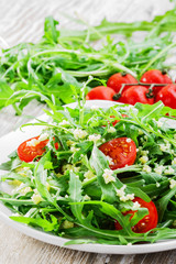 couscous salad with arugula and cherry tomatoes