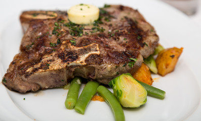 T-Bone Steak on Vegetable Garnish