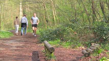 Young man working out in the forrest 