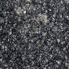 Pieces of broken bitumen asphalt