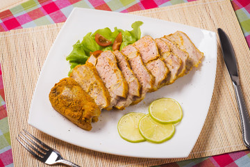 Roast pork with garlic and spices