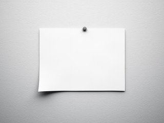 piece of blank paper tacked to white wall - obrazy, fototapety, plakaty