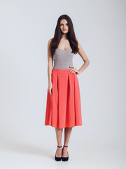Girl in beautiful skirt. red
