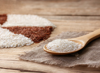 Fototapeta na wymiar white rice in a wooden spoon