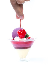 Strawberry shot cake with cherry and macaron
