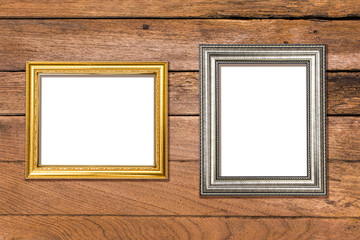 Gold frame on old wooden background