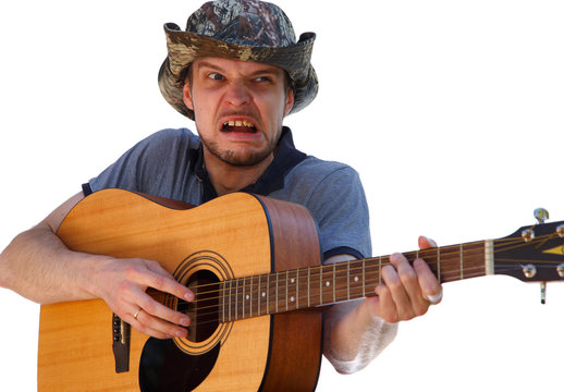 Man With Horrible Grimace Playing The Guitar