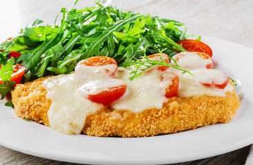Baked chicken with mozzarella and cherry tomatoes  fillet